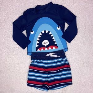 5/$20 Carters 12m shark rashguard and striped swim trunks Euc